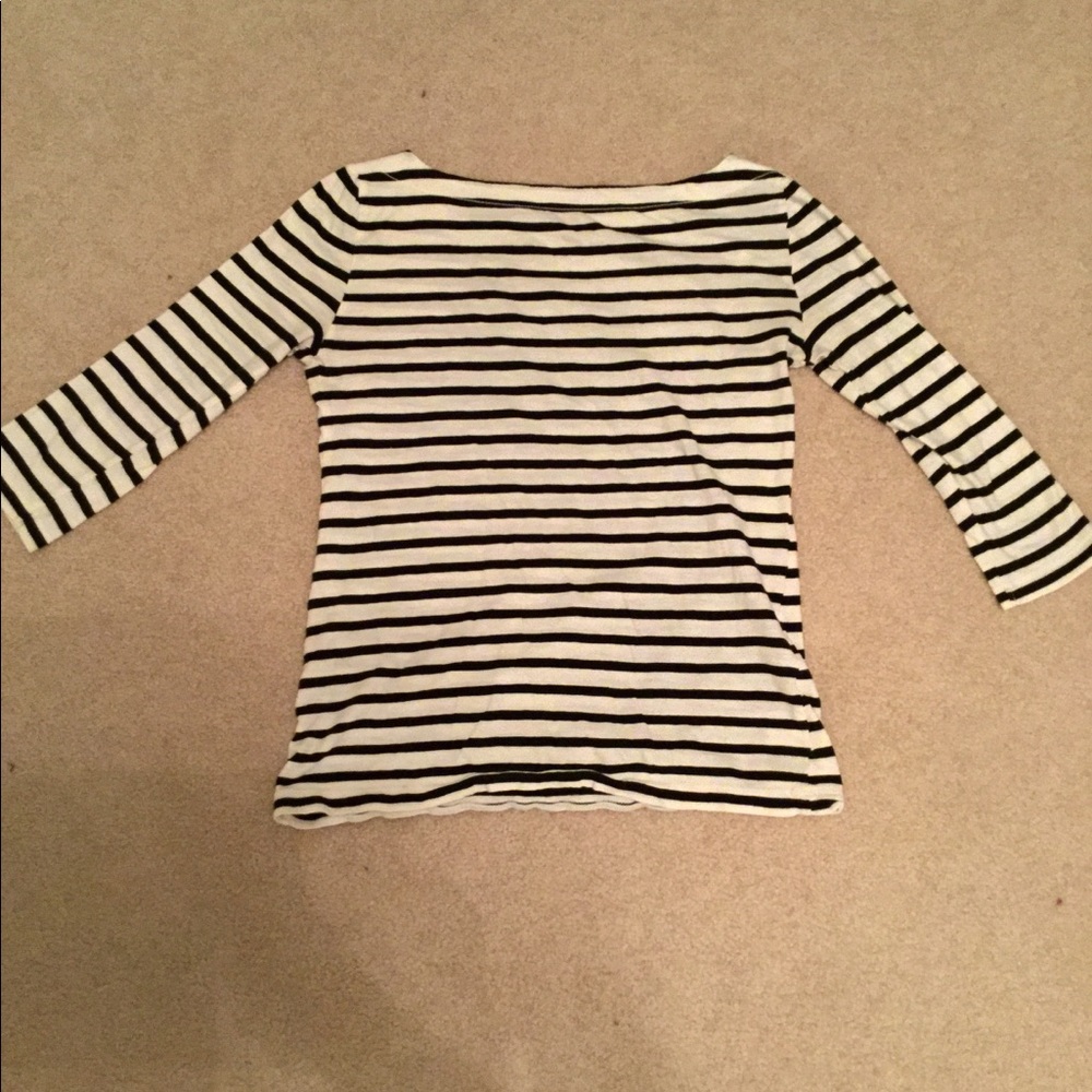Black and white striped shirt with heart in center
